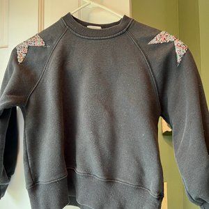 Girls sweatshirt with beaded stars on shoulders